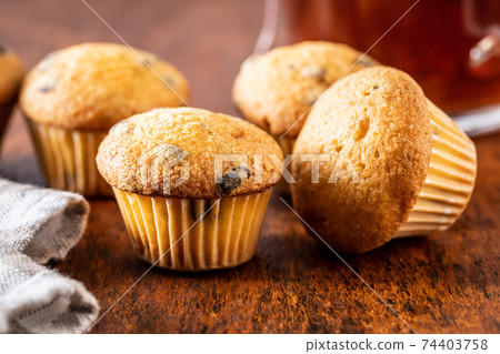 Vanilla muffins. Sweet cupcakes. Vanilla muffins. Sweet cupcakes. 74403758