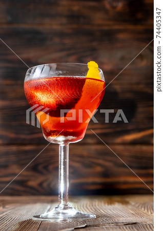 Glass of Boulevardier cocktail 74405347