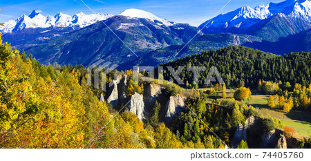 Impressive Italian Alps in Valle d'Aosta in golden autmn colors Impressive Italian Alps in Valle d'Aosta in golden autmn colors 74405760