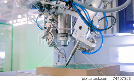 Process of selective soldering components to printed circuit boards at factory 74407598