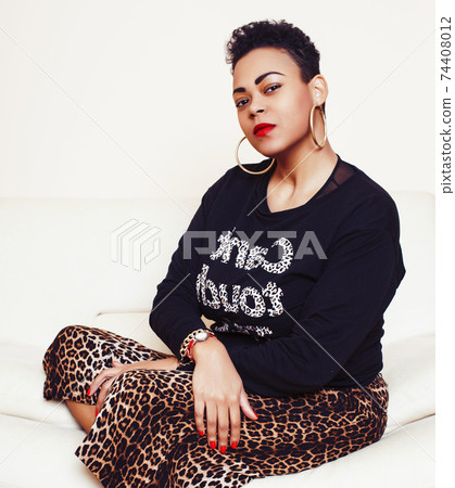 pretty stylish african american big mama woman well dressed. swag relax at home, leopard print on clothers. fashion look sunglasses pretty stylish african american big mama woman well dressed. swag relax at home, leopard print on clothers. fashion look sunglasses 74408012