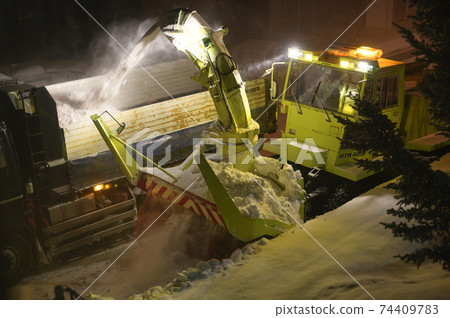 Midnight snow removal work 74409783