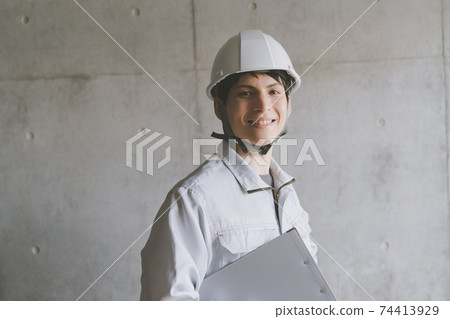 Concrete walls and workers Concrete walls and workers 74413929