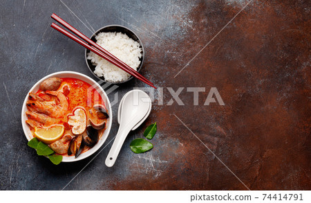 Traditional Thai soup Tom Yum and rice bowl Traditional Thai soup Tom Yum and rice bowl 74414791
