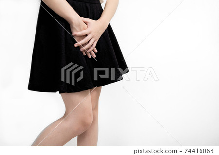 Lady girl with leucorrhoea,vaginitis,bacterial infection,young woman cover crotch or hold over her vagina with hands,vaginal discharge for bad fishy smell,unpleasant smell from private parts of female 74416063