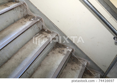 Garbage on the outer stairs Garbage on the outer stairs 74416697