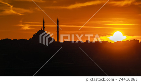 Evening atmosphere with dramatic sky over the dome Evening atmosphere with dramatic sky over the dome 74416863