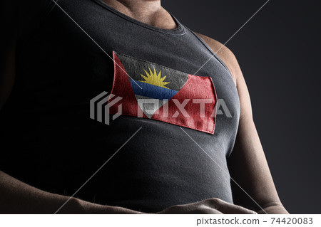 The national flag of Antigua and Barbuda on the athlete's chest The national flag of Antigua and Barbuda on the athlete's chest 74420083