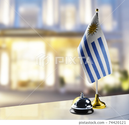 Uruguay flag on the reception desk in the lobby of the hotel Uruguay flag on the reception desk in the lobby of the hotel 74420121