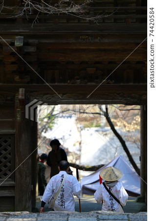 A pilgrim visiting a temple 74420584