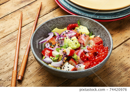 Avocado and seafood salad 74420976
