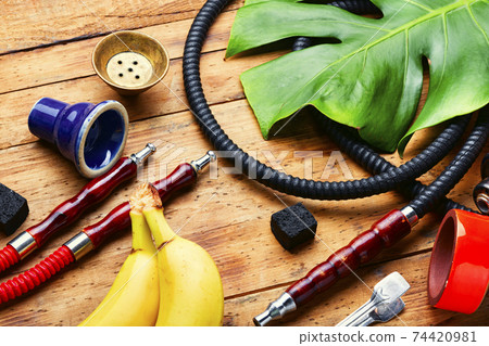 Hookah with popular banana flavor Hookah with popular banana flavor 74420981