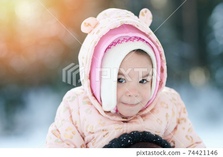 Winter portrait of kid with running nose Winter portrait of kid with running nose 74421146