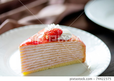 Strawberry mille crêpes served on a plate Strawberry mille crêpes served on a plate 74422375