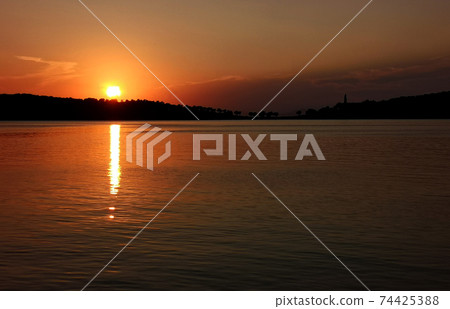 Beautiful magic sunset over the sea Beautiful magic sunset over the sea 74425388