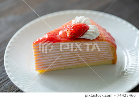 Strawberry mille crêpes served on a plate 74425466