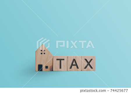 Tax word on wooden cube background. Business financial loan property. Tax word on wooden cube background. Business financial loan property. 74425677