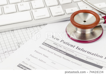 New patient medical record form and stethoscope medical. New patient medical record form and stethoscope medical. 74428134