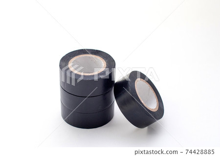 Stack of rolls black vinyl insulating tape on the white background. 74428885