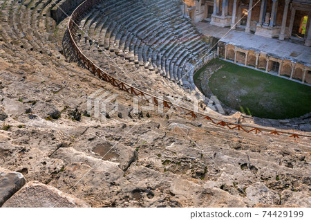 Roman amphitheater in the ruins of Hierapolis, in Pamukkale, Turkey. 74429199