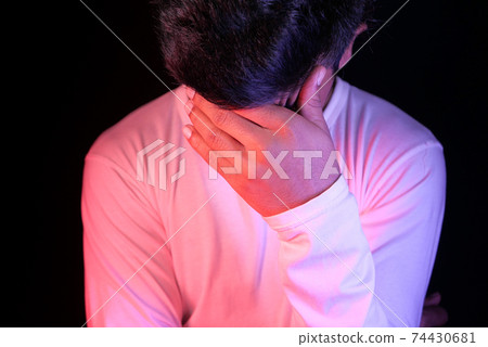 Close up of sad man covering face with hand. Close up of sad man covering face with hand. 74430681