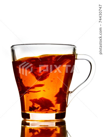 Tea cup tornado in cup isolated on white Tea cup tornado in cup isolated on white 74430747