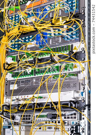 optical cables connected to internet service provider switch 74431542