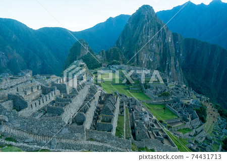 Machu Picchu is an archaeological site of the ancient Inca Empire located on a ridge at an altitude of about 2,450 m in the Andes Mountains of Peru, South America. 74431713