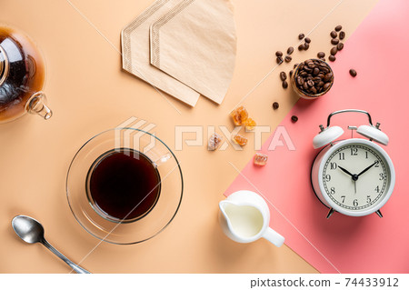 pouring coffee in a cup pouring coffee in a cup 74433912