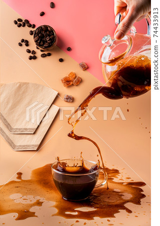 pouring coffee in a cup 74433913