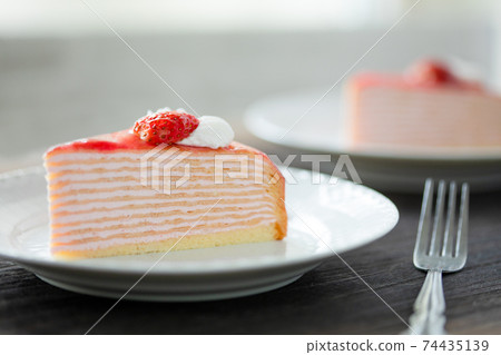 Strawberry mille crêpes served on a plate Strawberry mille crêpes served on a plate 74435139
