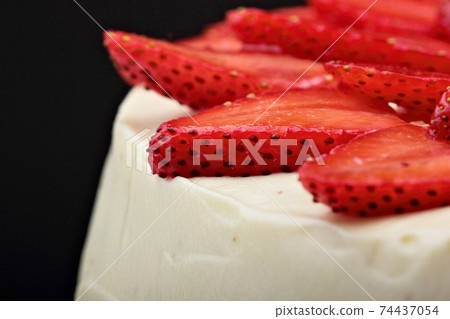 Strawberry cake with vanilla cream.Black background.Closeup Strawberry cake with vanilla cream.Black background.Closeup 74437054