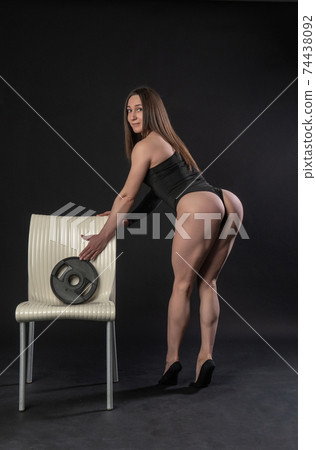 fitness woman gym black. In a black bathing suit. lower leg, human leg diet. Athleticism shape, torso waist. Talia is of Caucasian ethnicity. tilt takes a pancake fitness woman gym black. In a black bathing suit. lower leg, human leg diet. Athleticism shape, torso waist. Talia is of Caucasian ethnicity. tilt takes a pancake 74438092