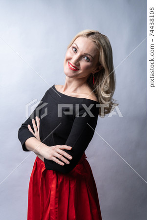 Girl Crossed arms beautiful happy valentine background, heart Valentine's day, on the floor hearts romance romance. the honeymoon. love formula of love, joy in a red dress girl, barefoot 74438108