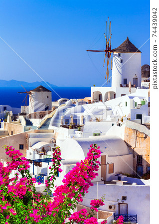 beautiful Greece . traditional windmills of Santorini 74439042