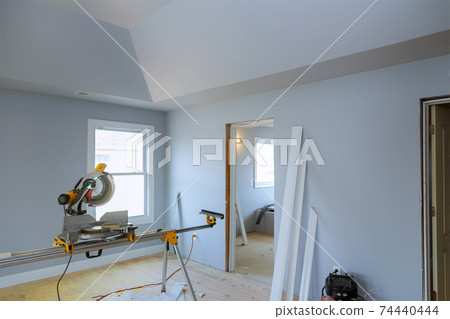 Close up of Circular saw cutting sharp rotary blade on woodwork 74440444