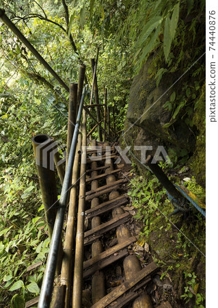 Trail towards the waterfall at Tumpak Sewu, East Java, Indonesia. Trail towards the waterfall at Tumpak Sewu, East Java, Indonesia. 74440876