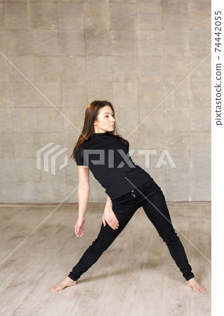 Young pretty modern style dancer. Young pretty modern style dancer. 74442055