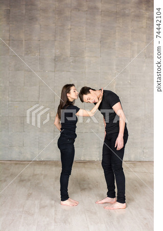 Young couple performing beautiful dance. 74442104