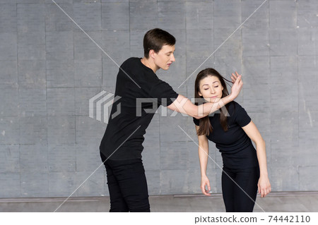 Young dancers practicing in studio. Young dancers practicing in studio. 74442110