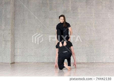 Beautiful couple practising dance elements. 74442130