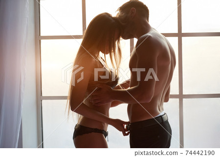 Sexy couple side view. Sexy couple side view. 74442190