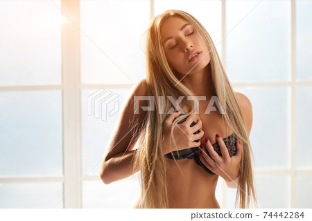 Sexy caucasian girl in bra. 74442284