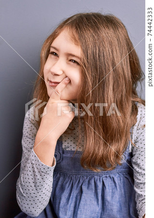 Little pretty thoughtful girl, portrait. 74442333