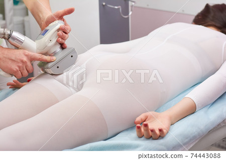 Vacuum roller massage. 74443088