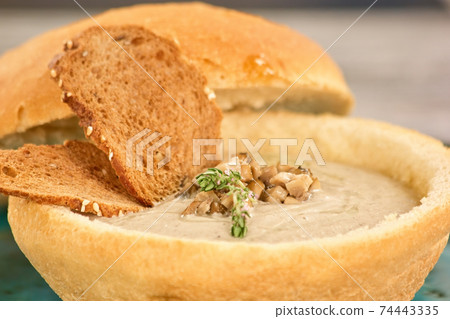 Cream soup with mushrooms, close up. 74443335