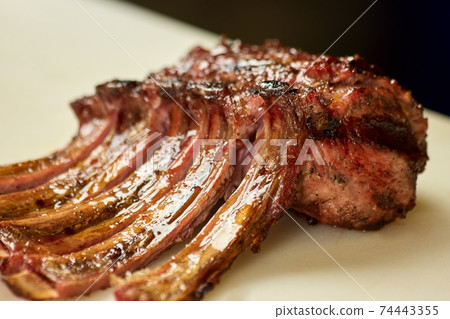 Prepared juicy pork, closeup. 74443355