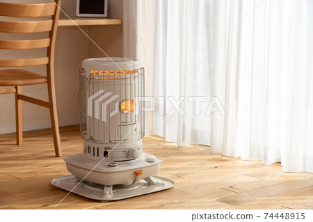 Living room stove with sunlight (winter) Living room stove with sunlight (winter) 74448915