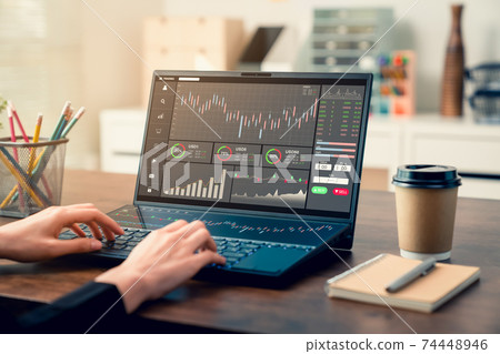 Stock exchange market concept, business people trader looking computer with graphs analysis. Stock exchange market concept, business people trader looking computer with graphs analysis. 74448946