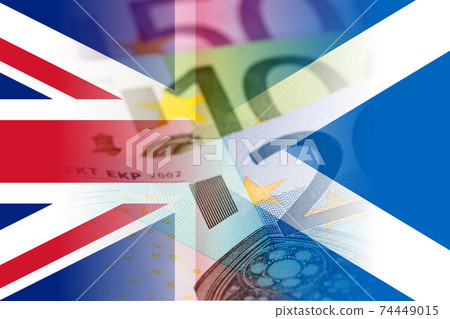 united kingdom and scotland flags with euro banknotes mixed imag 74449015